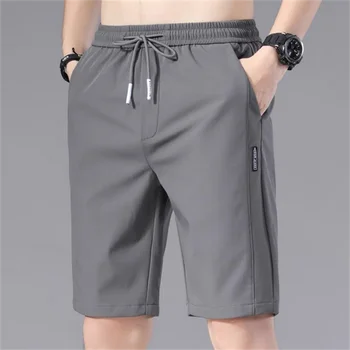 2023 Летни мъжки спортни шорти плътен цвят прав модел хлабав тип ластик шнур случайни шорти джогинг панталони