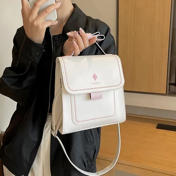 2023 Нови ежедневни жени розови сребърни черни чанти за рамо корейски дами ниша старши смисъл чанта сладък Kawaii бяла раница чанти